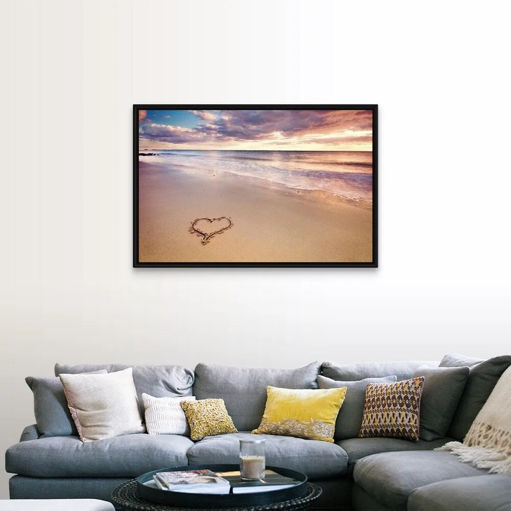 "A heart in the sand on a dutch beach during sunset." Black Float Frame Canvas Art