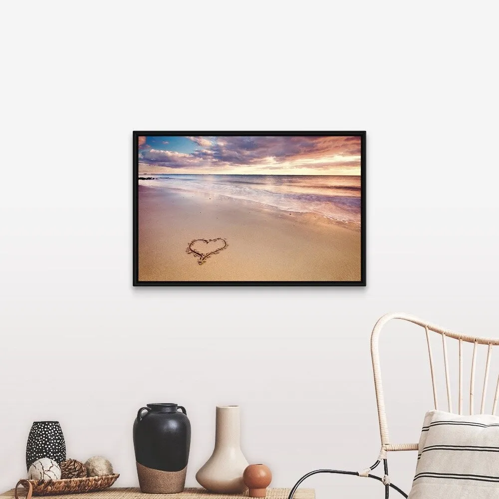 "A heart in the sand on a dutch beach during sunset." Black Float Frame Canvas Art