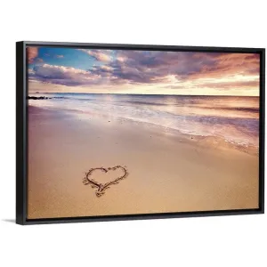 "A heart in the sand on a dutch beach during sunset." Black Float Frame Canvas Art