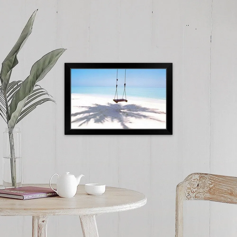 "Beach swing and shadow of palm tree on sand" Black Framed Print