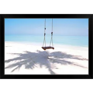 "Beach swing and shadow of palm tree on sand" Black Framed Print